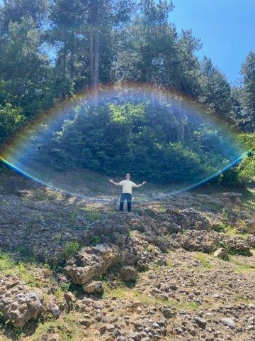 Alejandro, from Vibrational Revelations, surrounded by amazing energy at the base of the Pyramid of the Sun